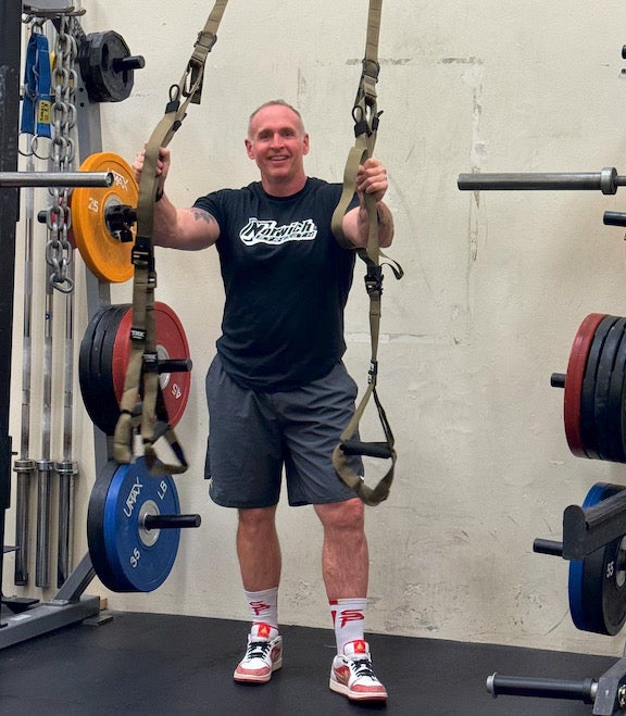 Image of Scott Caulfield in the weight room of Norwich Athletics