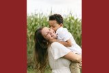 Amber Spector and her child