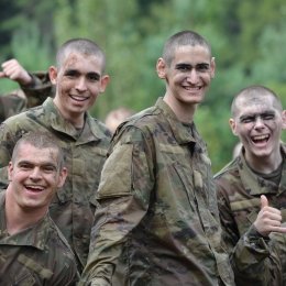 Norwich corps of cadets students smiling.