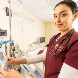 Nursing student working in the nursing labs.