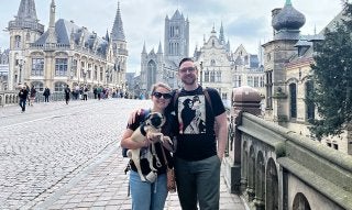 daniel pederson, wife, dog (pug) - in a city
