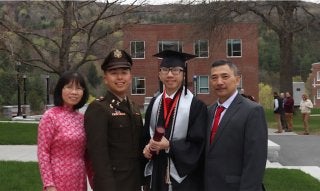 jimmy luong at graduation, on campus with parents and brother