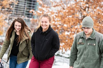 Norwich Cadets and Civilian Students Walking Campus Early Snowfall