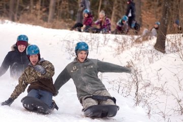 Shaw Outdoor Center Corps and Civilian students sledding