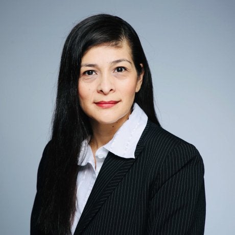 Woman in Business Suite with long dark hair