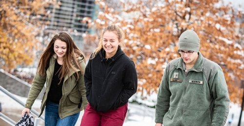 Norwich Cadets and Civilian Students Walking Campus Early Snowfall