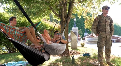 Norwich Students relaxing on hammocks