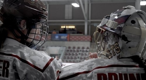 Norwich Womens Hockey Two Players Looking Over Rink - video cover