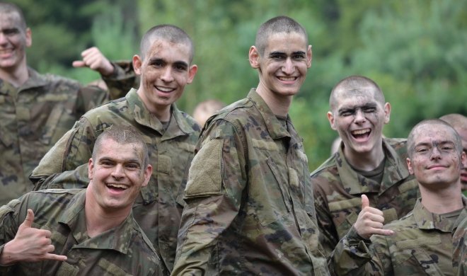 Norwich corps of cadets students smiling.