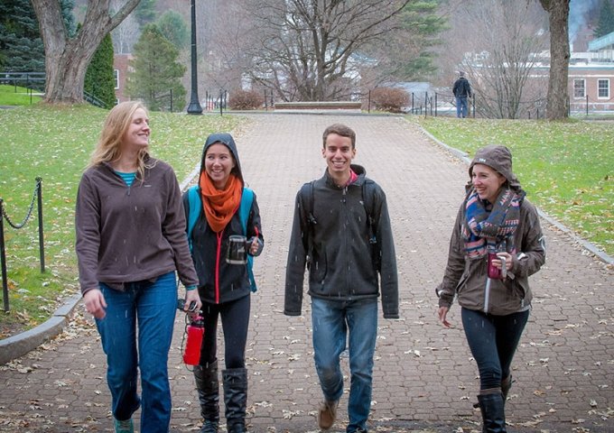 Civilian students walking on UP in a snow flurry.