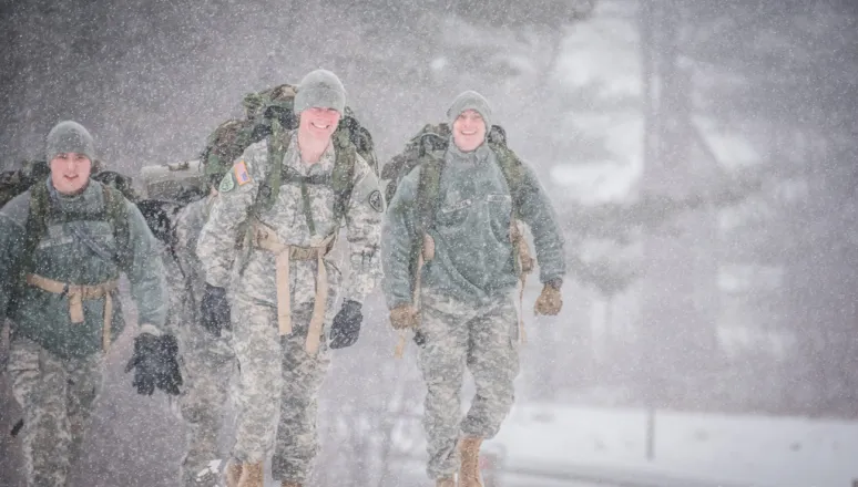 Three Mountain Cold Weather Cadets hiking in snow