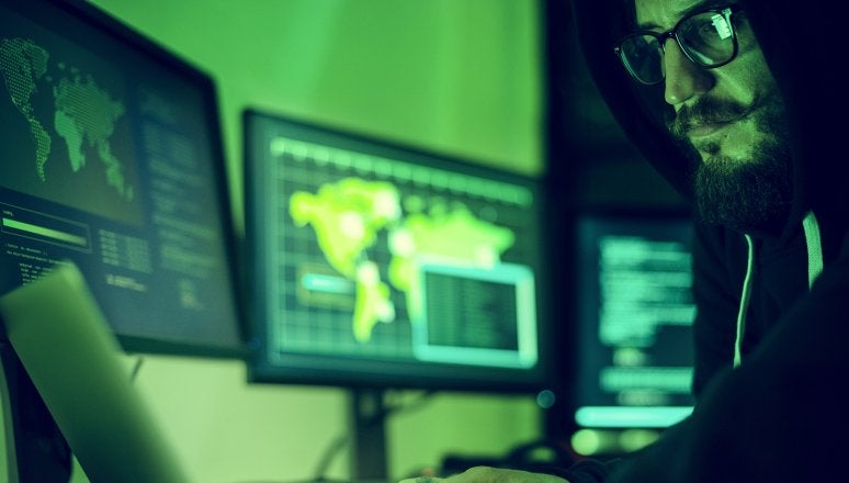 Image of a person working on the computer