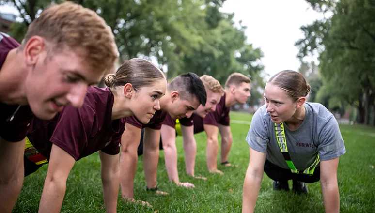 Rooks on the UP doing push ups with cadre encouragement.