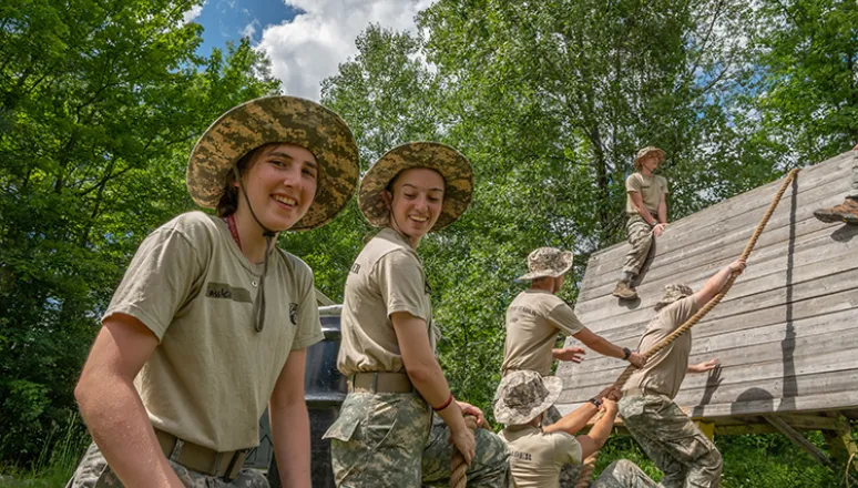 FLC campers tackling the obstacle course.