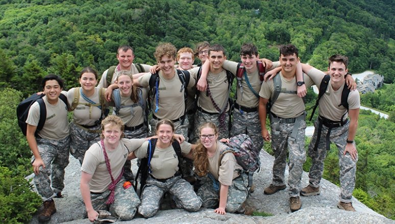 FLC campers on top of Deer Leap Mountain posing as a group.