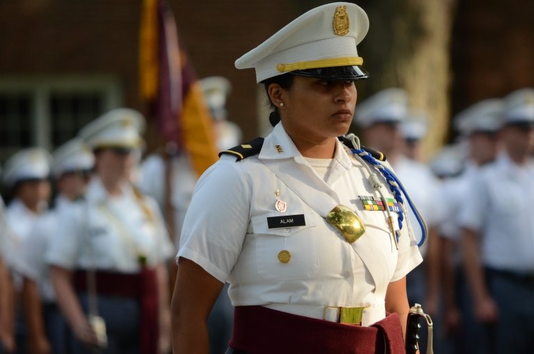 Female cadet leader marching on Norwich's Upper Parade Ground.