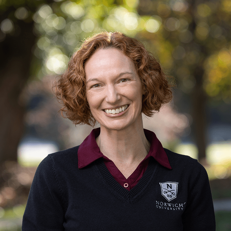 Portrait of Collette smiling.
