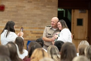 Images of the White Coat Ceremony during homecoming week. 