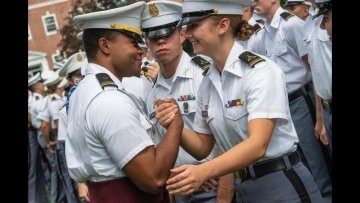 Company Commander Gabriel Williams shares a moment with his CSM during a formation on the first day of parents weekend.