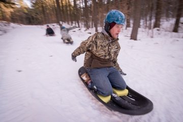 Students Sledding at Shaw Outdoor Center