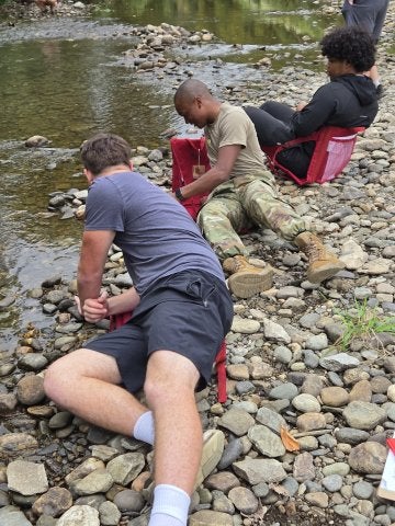 Students participating in a Partridge School of Outdoor Learning class on Paine Mountain at Norwich University. 